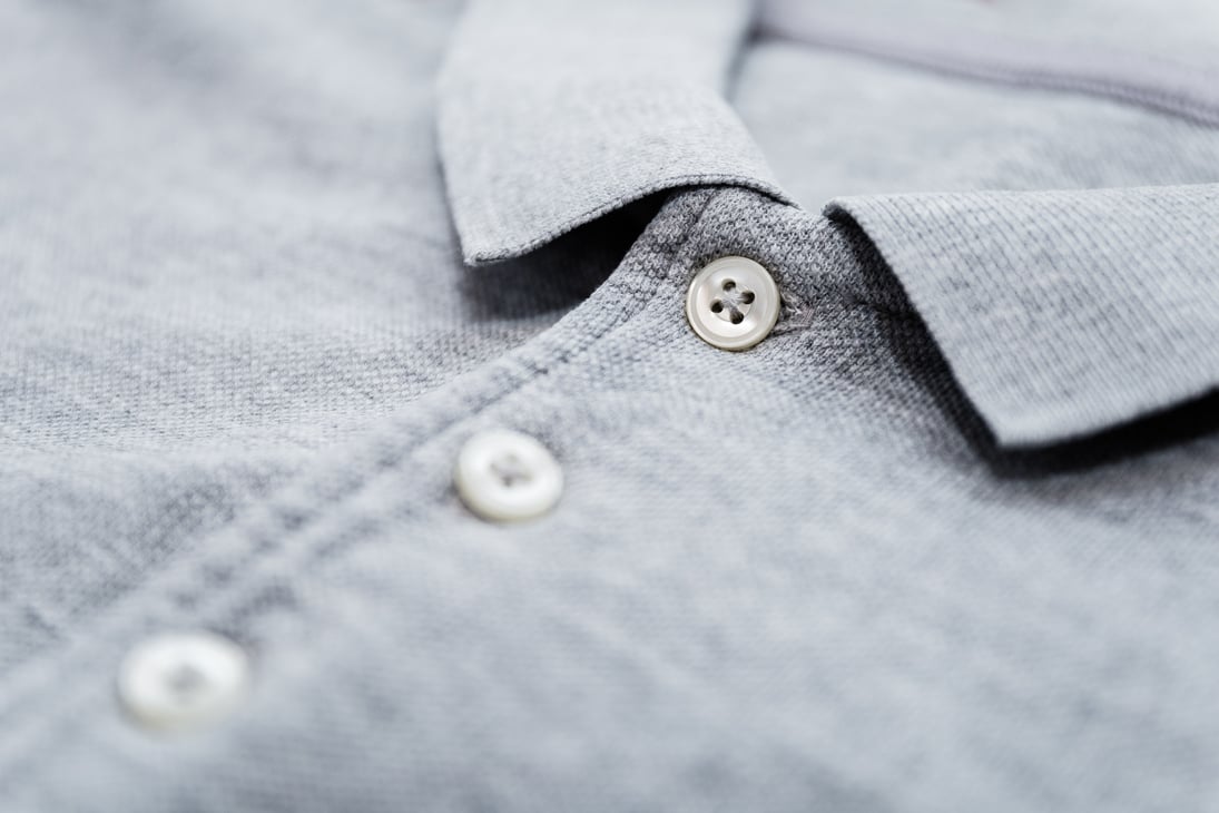 Polo shirt with buttoned collar neck